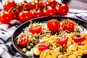 Breakfast - scrambled eggs with vegetables