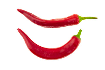 curved pod of peppers parallel vegetable on a white basis culinary design menu contrast background