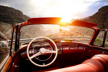 Summer car on road and sunset time in mountains.  - obrazy, fototapety, plakaty