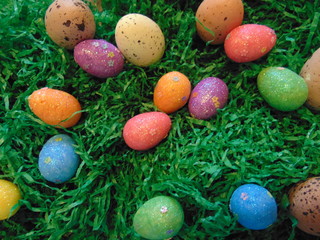 Fototapeta na wymiar Easter eggs in the grass. Colorful and beautiful decoration.