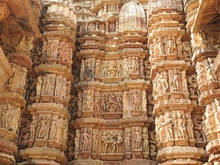 The Western group of Khajuraho temples, a UNESCO heritage site, is famous for its sexy erotic sculptures, India, clear day.