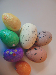 Beautiful Easter eggs on the heap together. White background.