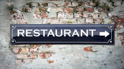 Street Sign to Restaurant