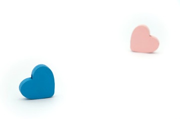 Blue and pink heart on a white background. Two lovers hearts on white isolated background