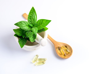 Herbal from herbs nature for good health, vitamin and mineral supplement for medication disease on white and wooden medical background, medicine and drug concept