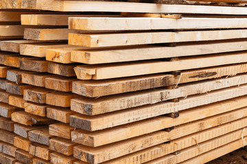stack boards warehouse of building materials high stack end background natural material