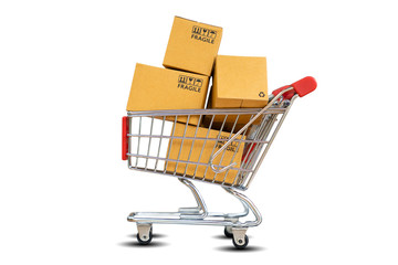 Online Shopping and delivering concept - Shopping cart with product package boxes isolated on white background