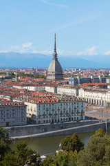 Turin view, Po river and Mole Antonelliana tower in a sunny summer day in Italy