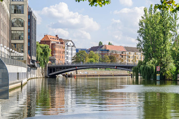 Obraz premium Banks of the River Spree with the bridge Gotzkowskybruecke in Berlin, Germany