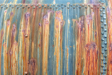 Old cracked rusty peeled colorful paint background texture close-up