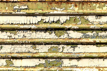 Old cracked rusty peeled colorful paint background texture close-up