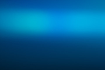 Smooth blue color gradient. Glowing abstract background. Lens flare effect.