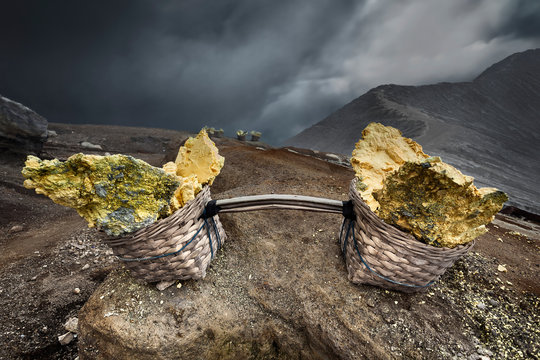 Baskets of mined Sulphur, Mount ljen, Banyuwangi, East Java, Indonesia