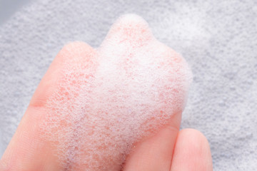 Foam on hand with bubbles