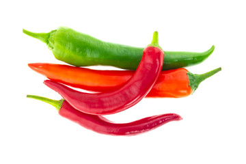 group of vegetables hot pepper red green pod on white background lots of bright base design