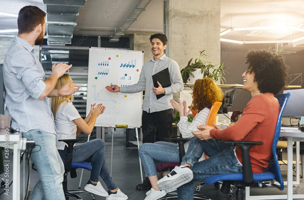 Poster young millennial team analyzing information on graphs and charts