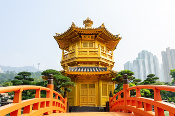 The Golden pavilion and gold bridge in Nan Lian Garden near Chi Lin Nunnery. A public chinese classical park in Diamond Hill, Kowloon in Hong Kong city
