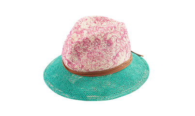 Pretty straw hat with ribbon and bow on white background. Beach hat top view isolated