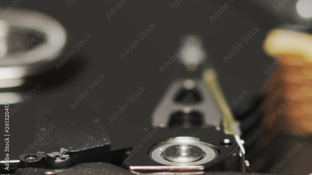Poster operating computer hdd or hard disk drive, slow motion macro. shot on red camera
