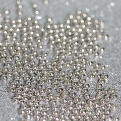 Silver Sprinkle Dragees. Sugar pearls. Extreme  Closeup