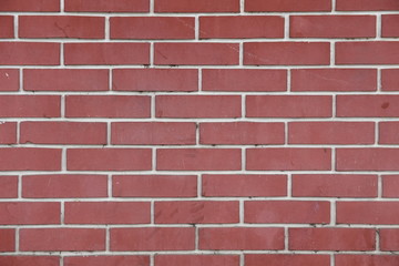 Dark red brick wall