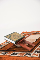 The holy Koran on praying carpet