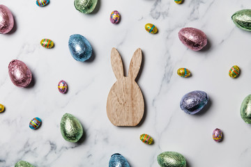 Easter bunny with foil wrapped chocolate easter eggs