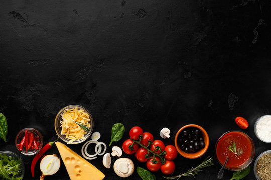 Frame of pizza cooking ingredients, vegetables and cheese
