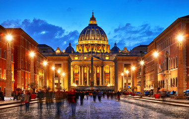 Fototapeta na wymiar Vatican City Holy( See). Dome of St. Peters Basil cathedral at Saint Peters Square. Evening sunset, blue hour with night sky and street lamps. Rome, Italy.
