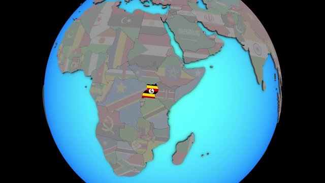 Closing in on Uganda with embedded national flag on blue political 3D globe. 3D illustration.