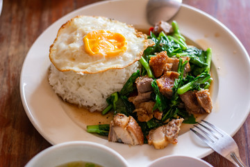Fried rice with basil, pork, fried egg, Thai food recipe (Fanta restaurant in Laos)
