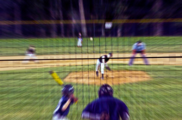 Blurred Youth Baseball Action