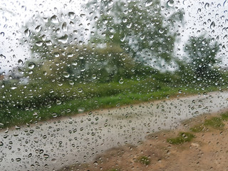 rain drops water leaf glass road