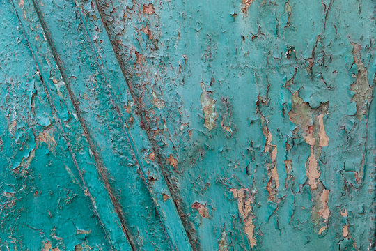 Old paint on rusty wall © misu
