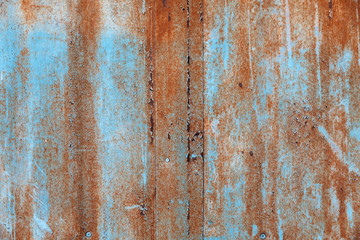 Old paint on rusty wall
