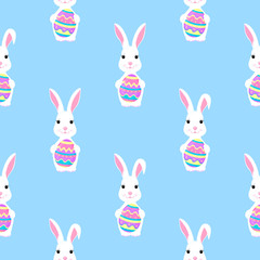 Easter bunny holds paint egg in paws seamless pattern.