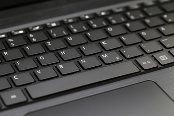 Laptop keyboard, black keyboard. Keyboard close up