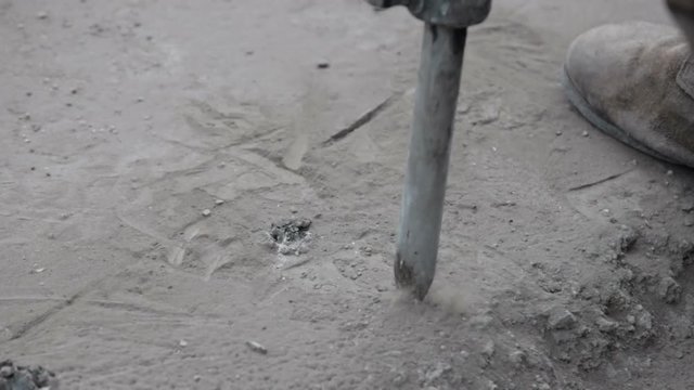  Demolition hammer hammering asphalt