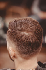 Vertical photo of man after barber, Hairstyle with parting