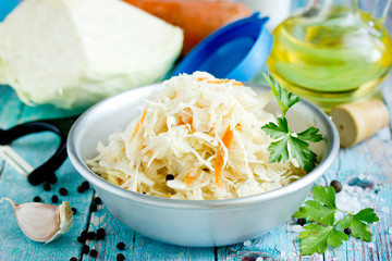 Homemade sauerkraut with carrot and spices, sweet and sour white cabbage