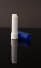 chat stick blue tube isolated on black background