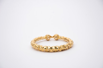 gold bangles isolated on white background