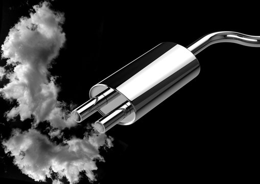 car pipe exhaust fumes and smoke isolated over black background. Concept of pollution of the environment caused by automobiles