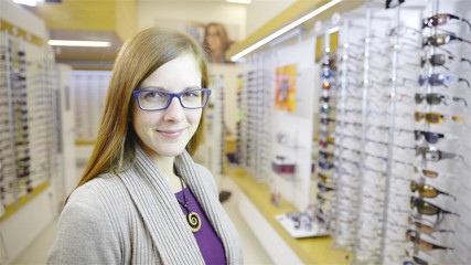 Woman with eyeglasses at the optician store
