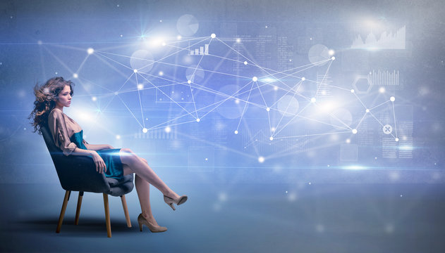 Elegant woman sitting in a sofa with network and connection concept
