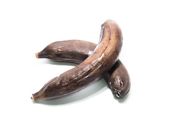 Rotten unhealthy banana isolated on white background. Over ripe banana. Banana expired.