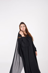 Naklejka premium Beautiful Arab woman in traditional dress dancing