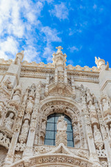 Fototapeta na wymiar Fragment of the Jeronimos or Hieronymites Monastery. Classified as UNESCO World Heritage it stands as a masterpiece of the Manueline art. Lisbon, Portugal