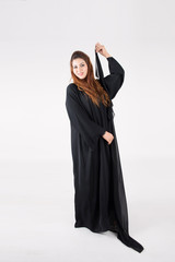 Naklejka premium Beautiful Arab woman in traditional dress dancing