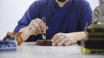 Mixing ink stick in water